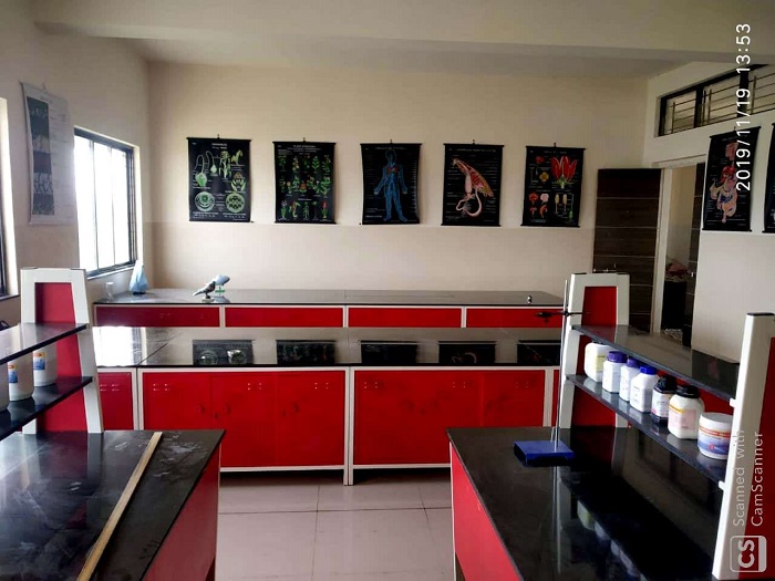 Students working together on a science project in the lab